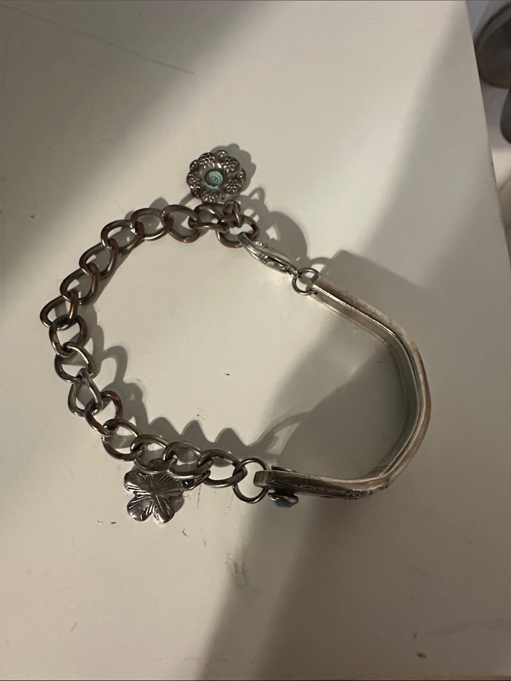 Silver Charm Chain Bracelet with Floral Accents